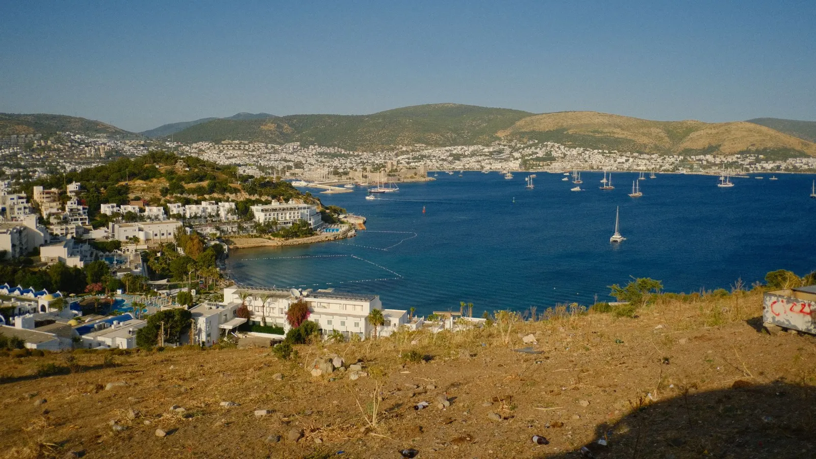 View over Bodrum bay with sailboats and whitewashed houses