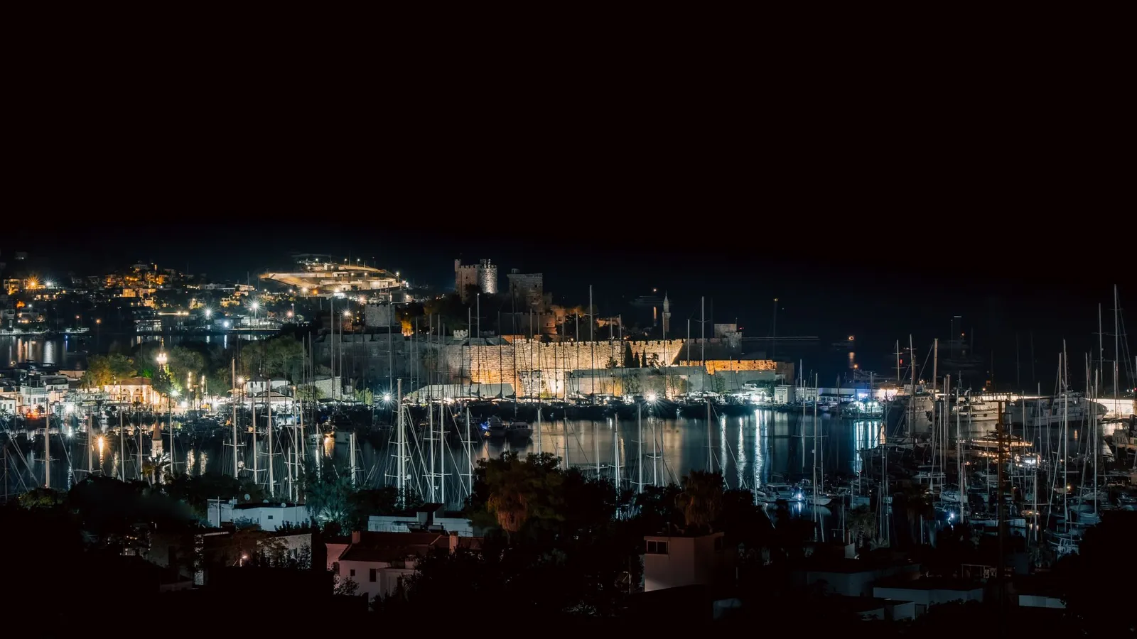 Bodrum castle and harbour illuminated at night