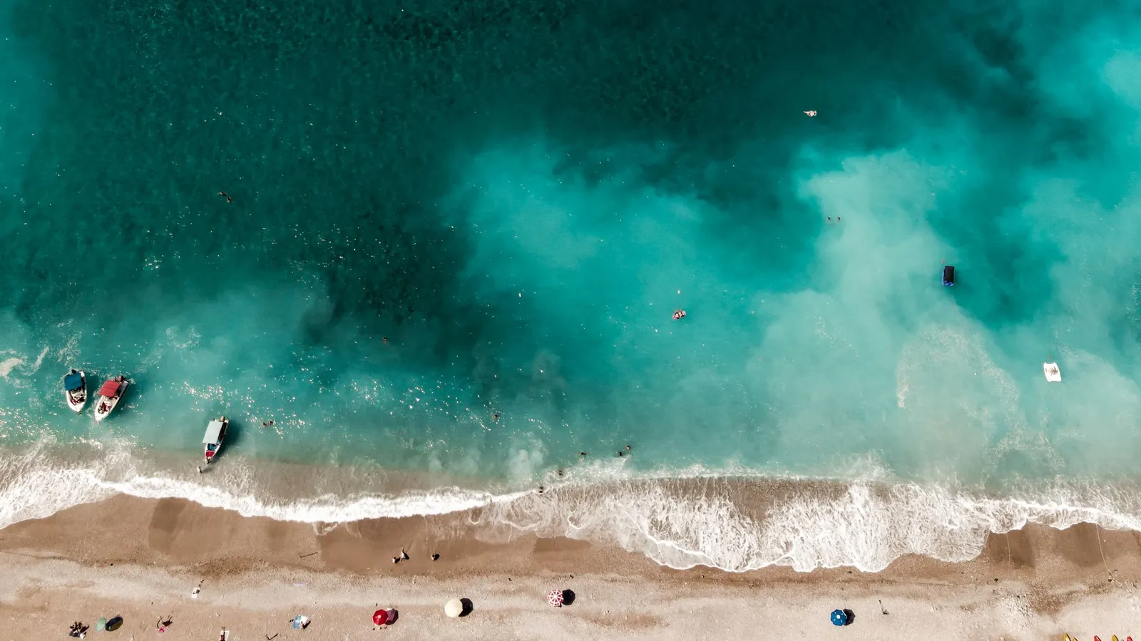 Aerial view of a sandy beach and turquoise sea on the Dalaman coast