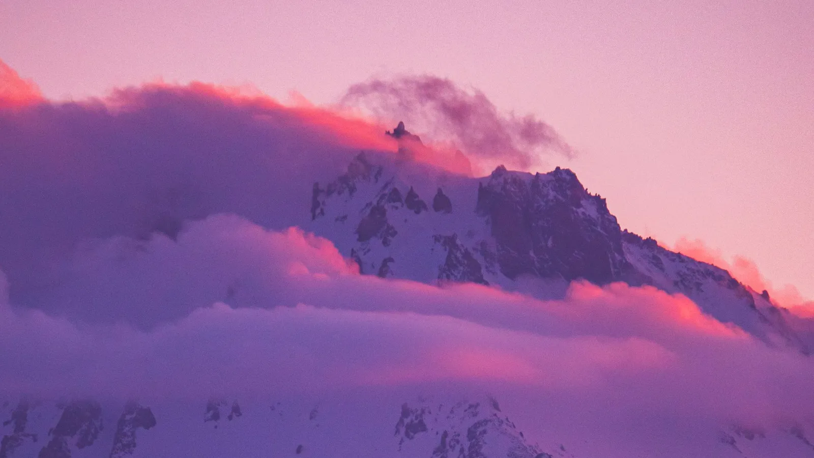 Snow-covered peak of Mount Erciyes at sunset above the ski resort